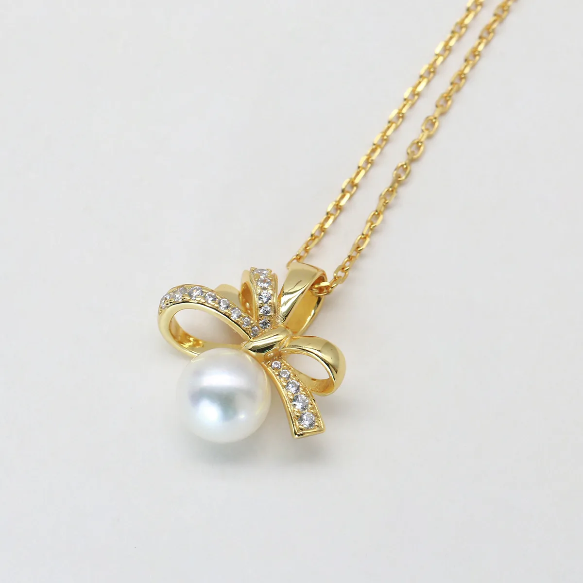 ICP001818 S925 Silver 18K Gold Freshwater Pearl Light Luxury Bow Necklace/ Pearl 7.0mm