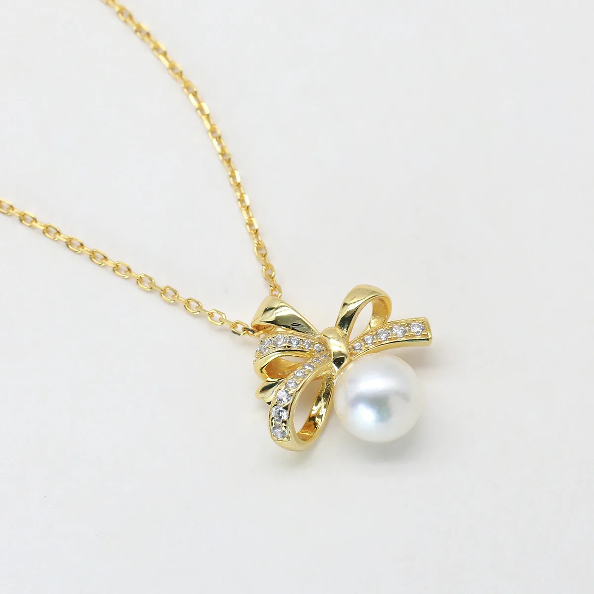 ICP001818 S925 Silver 18K Gold Freshwater Pearl Light Luxury Bow Necklace/ Pearl 7.0mm